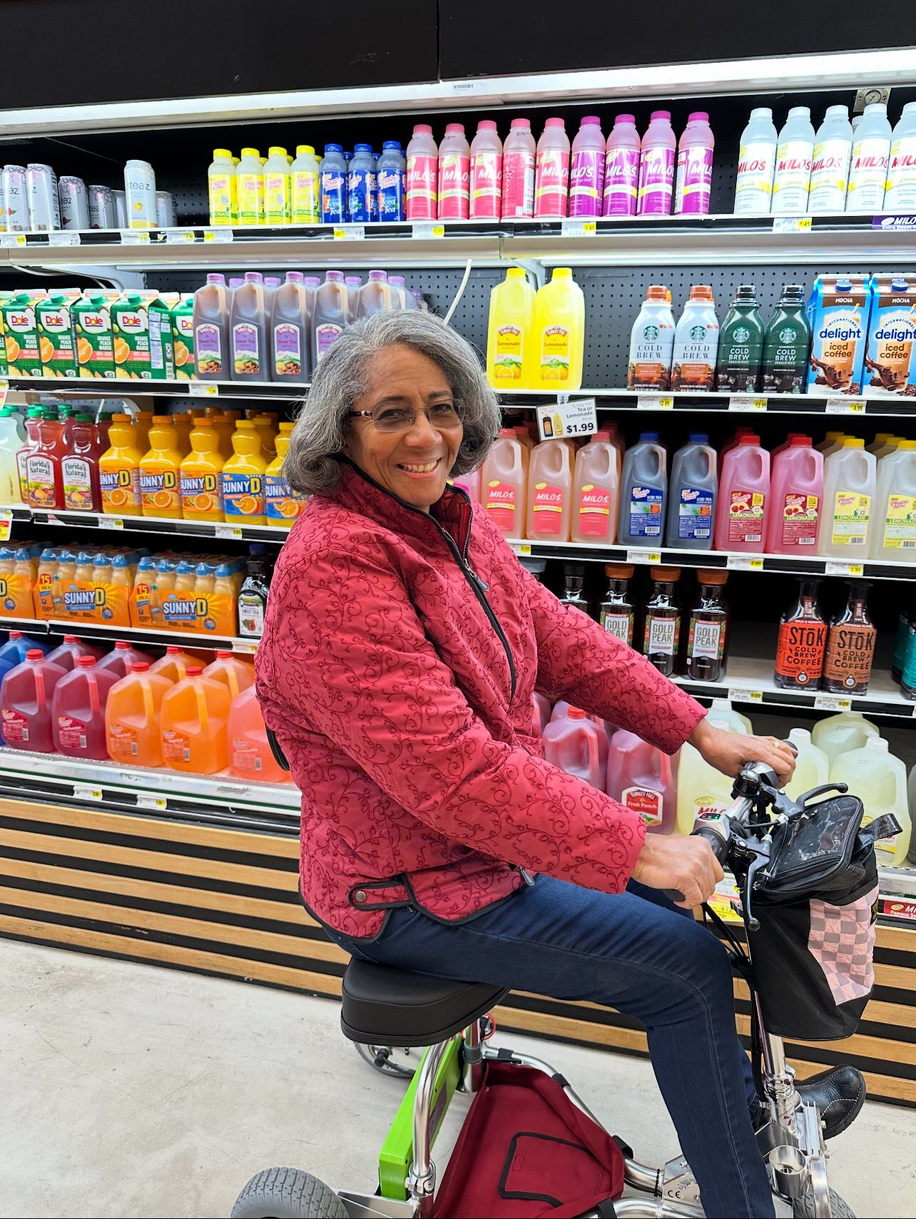 woman on mobility scooter in the grocery store. 
