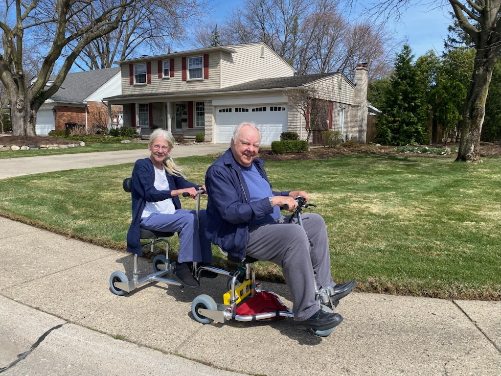 Couple using the passenger trailer.